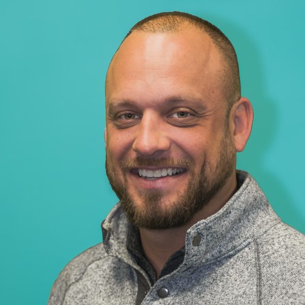Aaron Christy founder Mass Ave Commercial Roofing